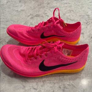 Nike woman’s  Pink and Yellow Athletic Shoes
